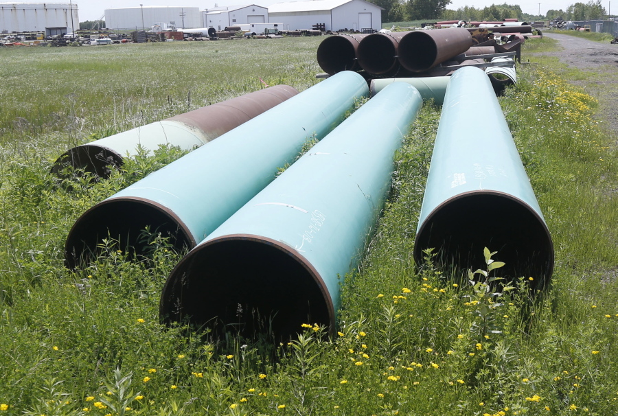 FILE - In this June 29, 2018, file photo, pipeline used to carry crude oil is shown at the Superior, Wis., terminal of Enbridge Energy. June will be a critical month for Enbridge Energy's Line 3 crude oil pipeline as the company resumes construction and opponents mobilize for large-scale protests and civil disobedience. Winona LaDuke of Honor the Earth says she expects thousands of people from across the state and country to join the protests in northern Minnesota.