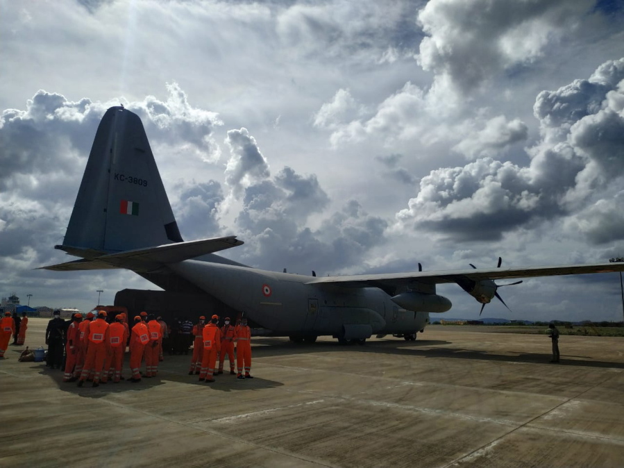 This Sunday, May 16, 2021, photograph provided by India's Defense Ministry shows an Indian Air Force plane preparing to transport National Disaster Response Force personnel and material to western Gujarat state in preparation of Cyclone Tauktae from Kolkata, India. A severe cyclone is roaring in the Arabian Sea off southwestern India with winds of up to 140 kph (87 mph), already causing heavy rains and flooding that have killed multiple people, officials said Sunday. Cyclone Tauktae, the season's first major storm, is expected to make landfall early Tuesday in Gujarat state, a statement by the India Meteorological Department said.