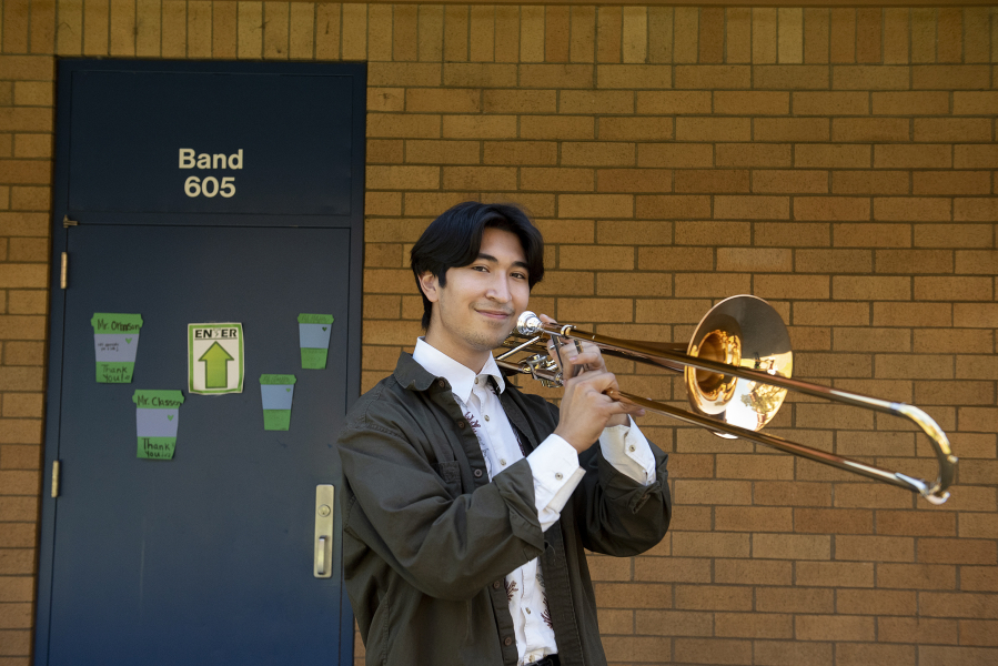 Mountain View High School senior Diego Inzunza pauses for a portrait outside the school's band room.