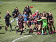 Portland Thorns goalkeeper AD Franch (24) joins the celebration after defeating NJ/NY Gotham FC in the NWSL Challenge Cup soccer final at Providence Park, Saturday, May 8, 2021, in Portland, Ore.