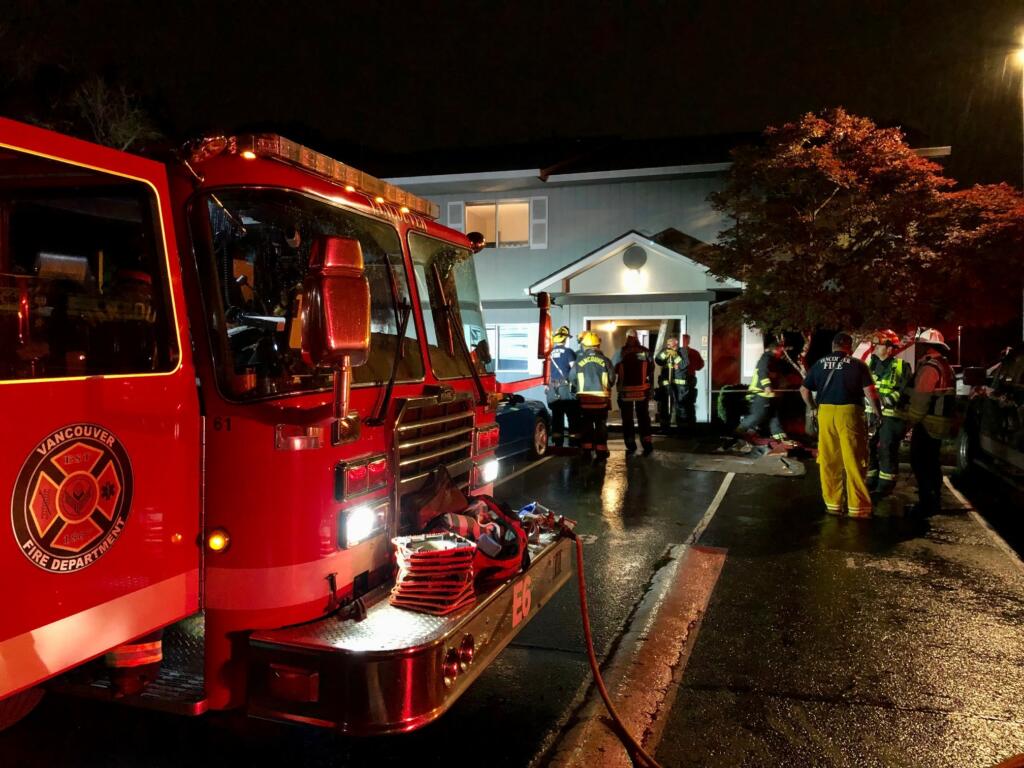Vancouver firefighters respond to a blaze at Oak Creek Apartments on 49th Street in east Vancouver early Thursday morning.