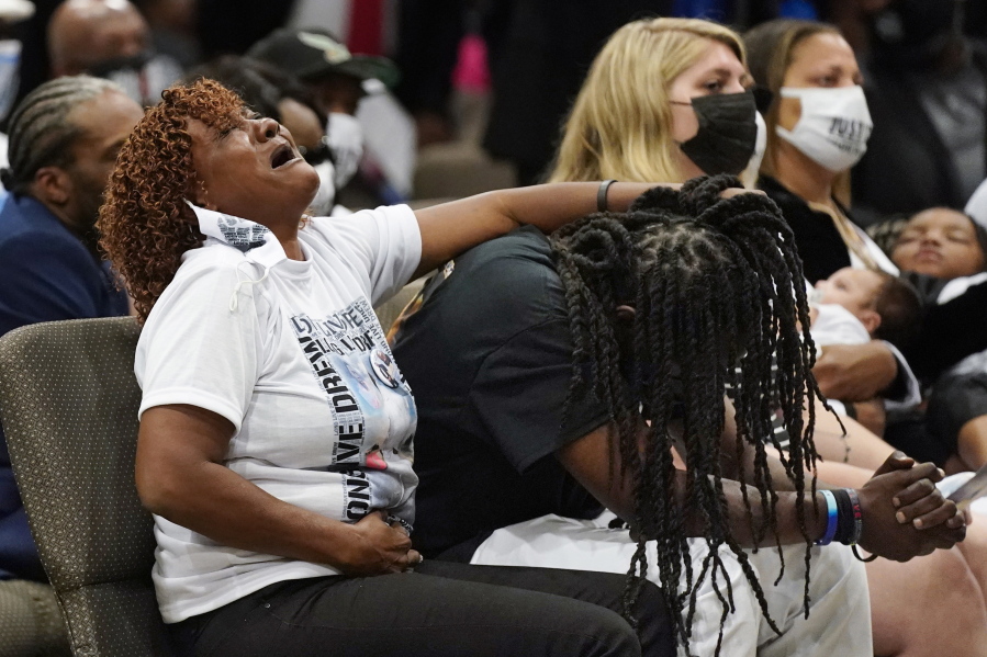 Family members react during the funeral for Andrew Brown Jr., Monday, May 3, 2021, at Fountain of Life Church in Elizabeth City, N.C. Brown was fatally shot by Pasquotank County Sheriff deputies trying to serve a search warrant.
