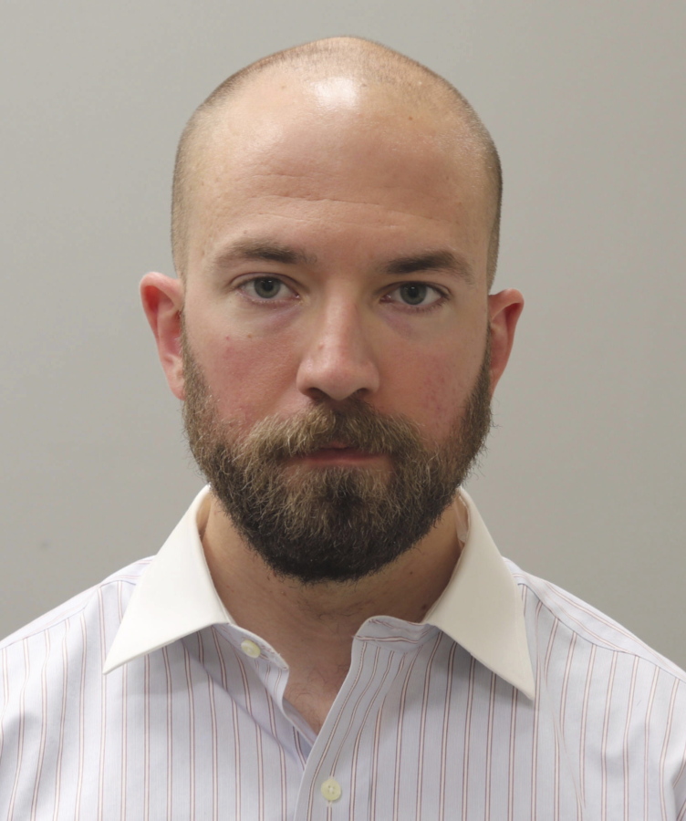 This booking photograph from Friday, May 7, 2021, shows Huntsville, Ala., police officer William Darby, who was convicted of murder in a fatal shooting that happened in 2018. Prosecutors argued that Darby had no justifiable reason to shoot Jeffrey Parker as Parker held a gun to his own head.
