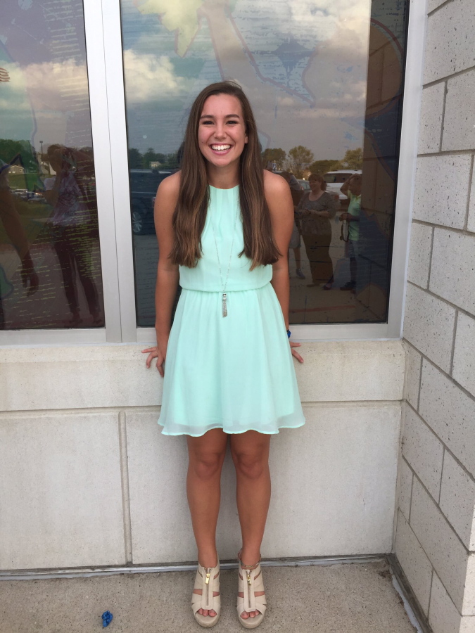 In this September 2016 photo provided by Kim Calderwood, Mollie Tibbetts poses for a picture during homecoming festivities at BGM High School in her hometown of Brooklyn, Iowa. Cristhian Bahena Rivera, the man charged with killing Tibbetts while she was out for a run in July 2018, will stand trial for first-degree murder on Monday, May 17, 2021, in Davenport, Iowa.