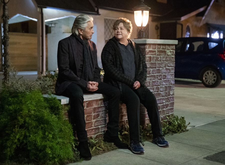 This image released by Netflix shows Michael Douglas, left, and Kathleen Turner in a scene from the third and final season of "The Kominsky Method." (Erik Voake/Netflix via AP) (Erik Voake/Netflix)