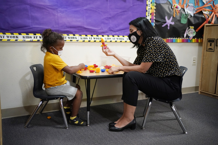 Teacher Juliana Urtubey, right, interacts with Kamari Wolfe in a class at Kermit R Booker Sr Elementary School Wednesday, May 5, 2021, in Las Vegas. Urtubey is the the 2021 National Teacher of the Year.