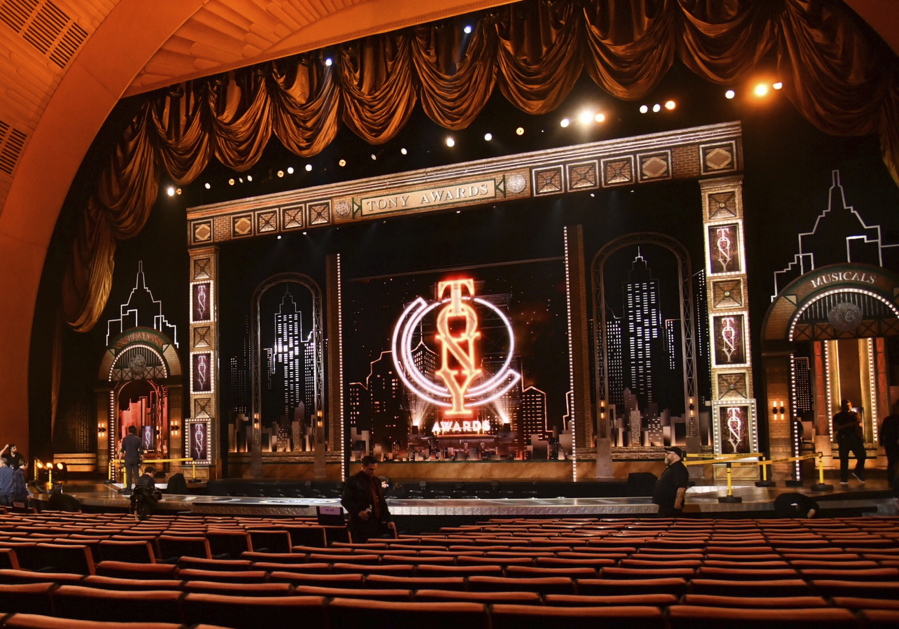 FILE - Workers prepare for the 73rd annual Tony Awards in New York on June 9, 2019. Producers of the telecast announced Wednesday that the Tonys will be held Sept. 26 and will air on CBS as well as Paramount+.