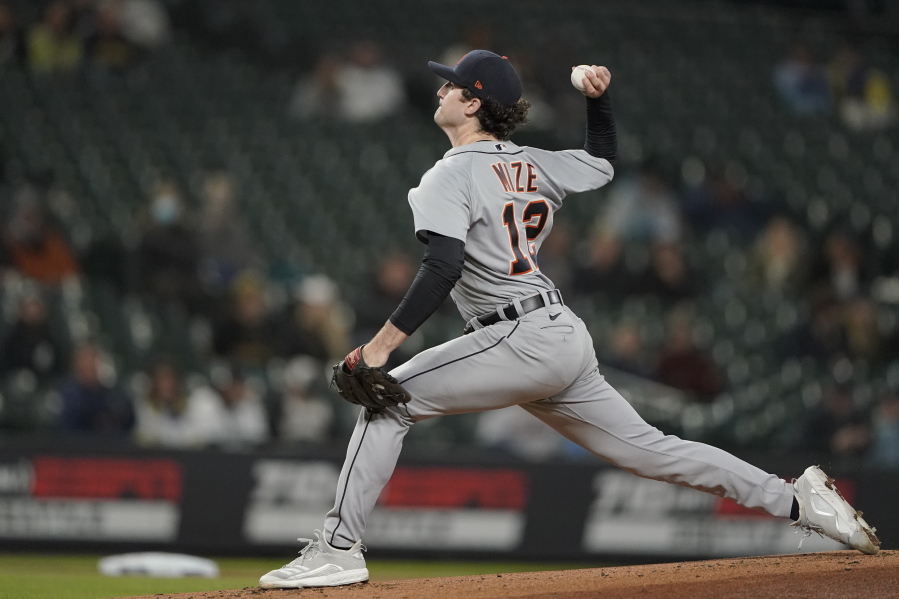 Detroit Tigers starting pitcher Casey Mize throws against the Seattle Mariners during the first inning of a baseball game, Monday, May 17, 2021, in Seattle. (AP Photo/Ted S.
