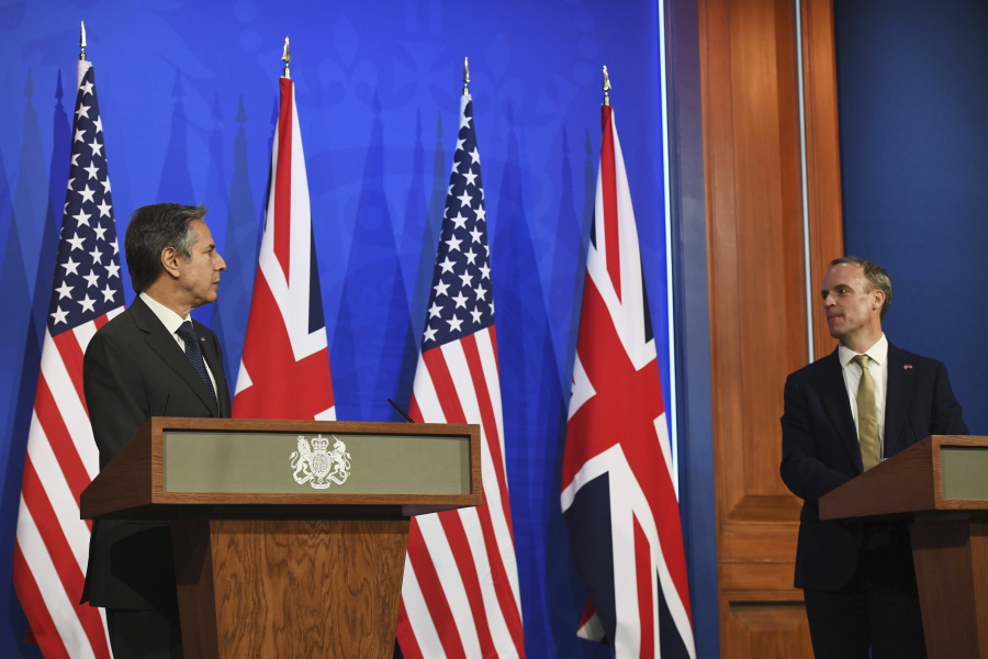 In this May 3, 2021, photo, Britain's Foreign Secretary Dominic Raab, right, and U.S. Secretary of State Antony Blinken speak at a news conference at Downing Street in London. A flurry of diplomatic activity and reports of major progress suggest that indirect talks between the U.S. and Iran may be nearing a conclusion. (Chris J.