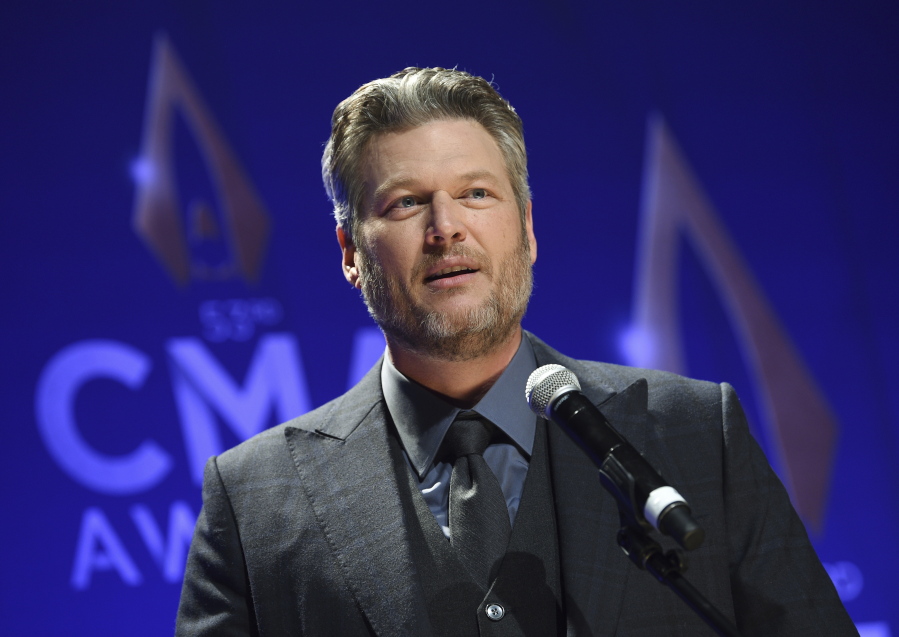 FILE - In this Nov. 13, 2019, file photo, singer Blake Shelton speaks in the press room after winning single of the year award for "God's Country" at the 53rd annual CMA Awards at Bridgestone Arena in Nashville, Tenn. The CMA will provide 4 million meals in cities with large populations of musicians and music industry professionals in partnership with Feeding America, and will also launch a donation challenge to fund  additional meals through its MICS Covid-19 initiative Monday, May 10, 2021. Shelton said he is proud to be part of the initiative and drumming up more support to raise funds for the food banks.