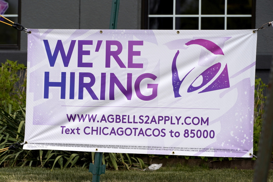 A hiring sign is displayed outside of a restaurant during the COVID-19 pandemic in Glenview, Ill., Saturday, May 8, 2021. US job growth slows sharply in sign of hiring struggles. Employers added just 266,000 jobs in April, sharply lower than in March and far fewer than economists had expected. The unemployment rate rose for the first time since April 2020. (AP Photo/Nam Y.