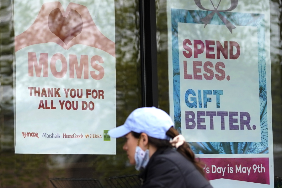 Signs about Mother's Day are displayed at a home decor department store in Northbrook, Ill., Saturday, May 8, 2021. (AP Photo/Nam Y.