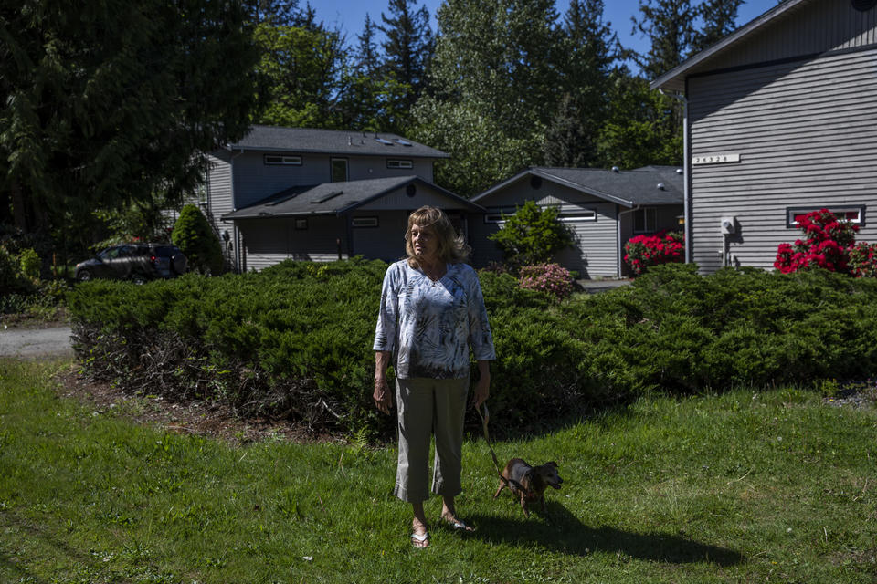 Carol Porter outside of her former home that she lived in for 25 years in Issaquah on May 17, 2021. Porter lost her home when she filed for bankruptcy in 2015 because the Washington Law that was meant to prevent this from happening had not kept up with rising home prices. A new law aims to keep people in their homes if they file for bankruptcy, raising the protected amount to better match King County’s medium home price.