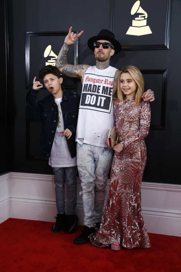 Blink-182 drummer Travis Barker with his children during the arrivals at the 59th Annual Grammy Awards at Staples Center in Los Angeles in 2017.