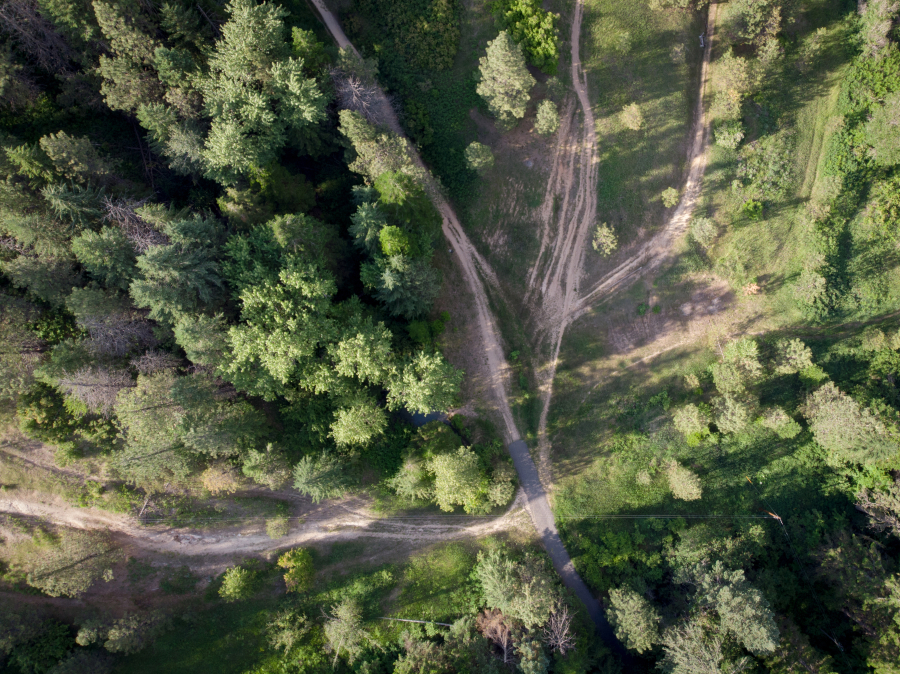 An aerial shot shows eroded roads near Big Rock in the Dishman Hills Conservation area.