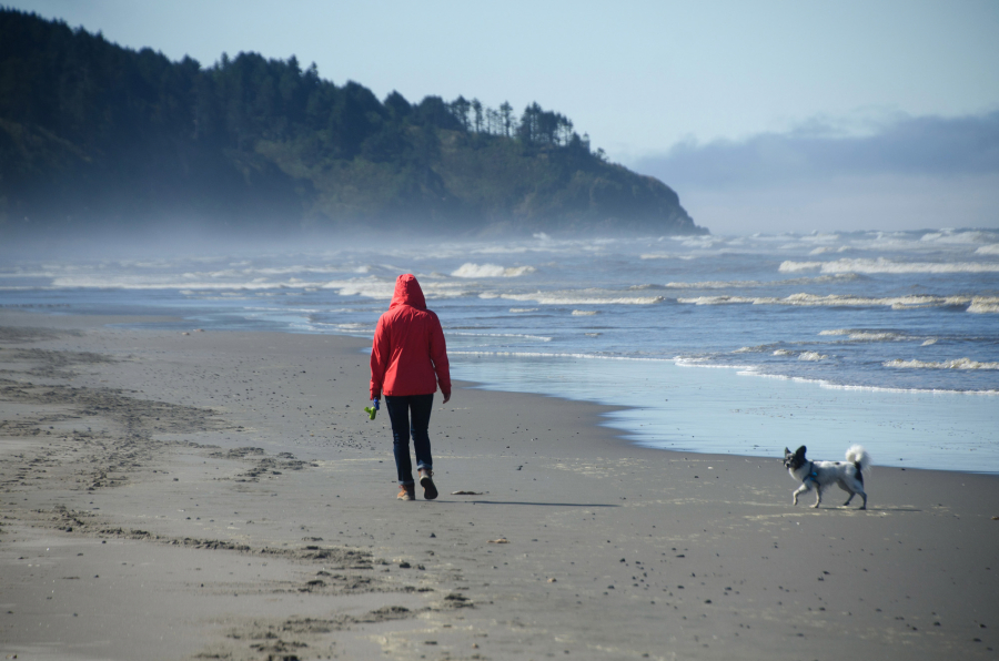 Beachgoers stroll on the sand in Seaview, on Washington's Long Beach peninsula.