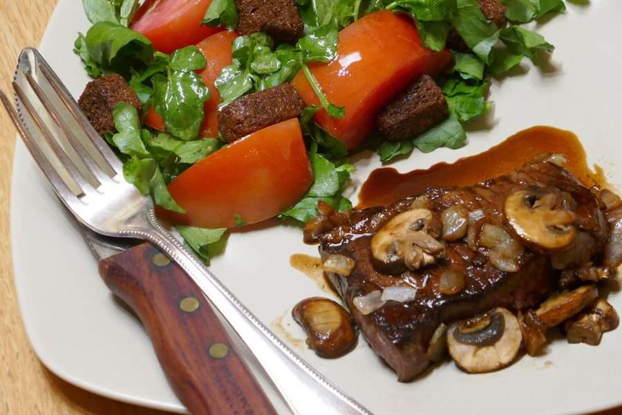 Balsamic-Glazed Steak with Tomato and Watercress Salad (Linda Gassenheimer/TNS)