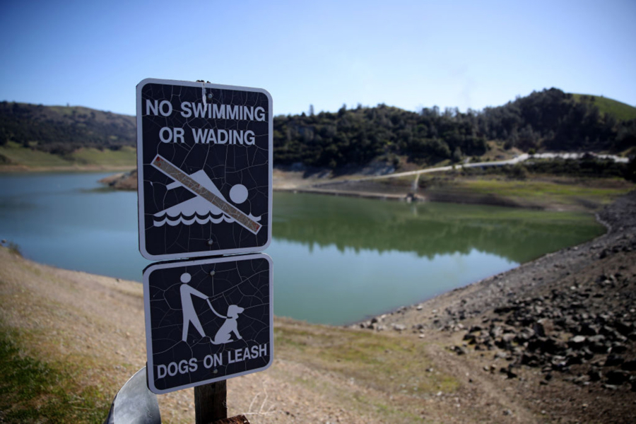 A no swimming sign is posted at Anderson Reservoir on February 25, 2020 in Morgan Hill, California.