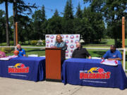 Vancouver Mayor Anne McEnerny-Ogle speaks during an event to celebrate the return of the Vancouver Volcanoes basketball franchise on Thursday at Camas Meadows Golf Course. She was joined by, from left, Volcanoes general manager Jeff Perrault, The Basketball League president Dave Magley and Volcanoes owner Curtis Hill.