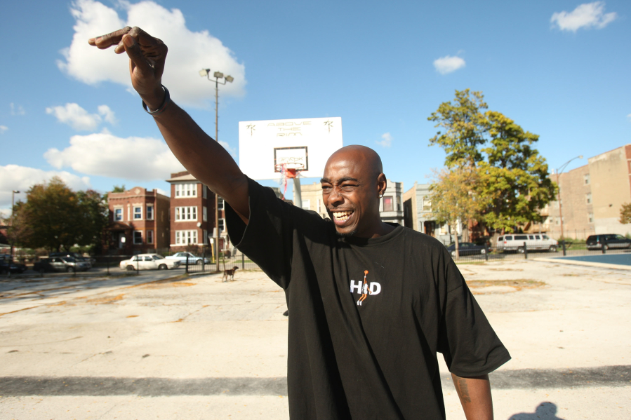 Arthur Agee, one of the stars of the movie "Hoop Dreams," waves to an old friend in 2008 in Chicago.