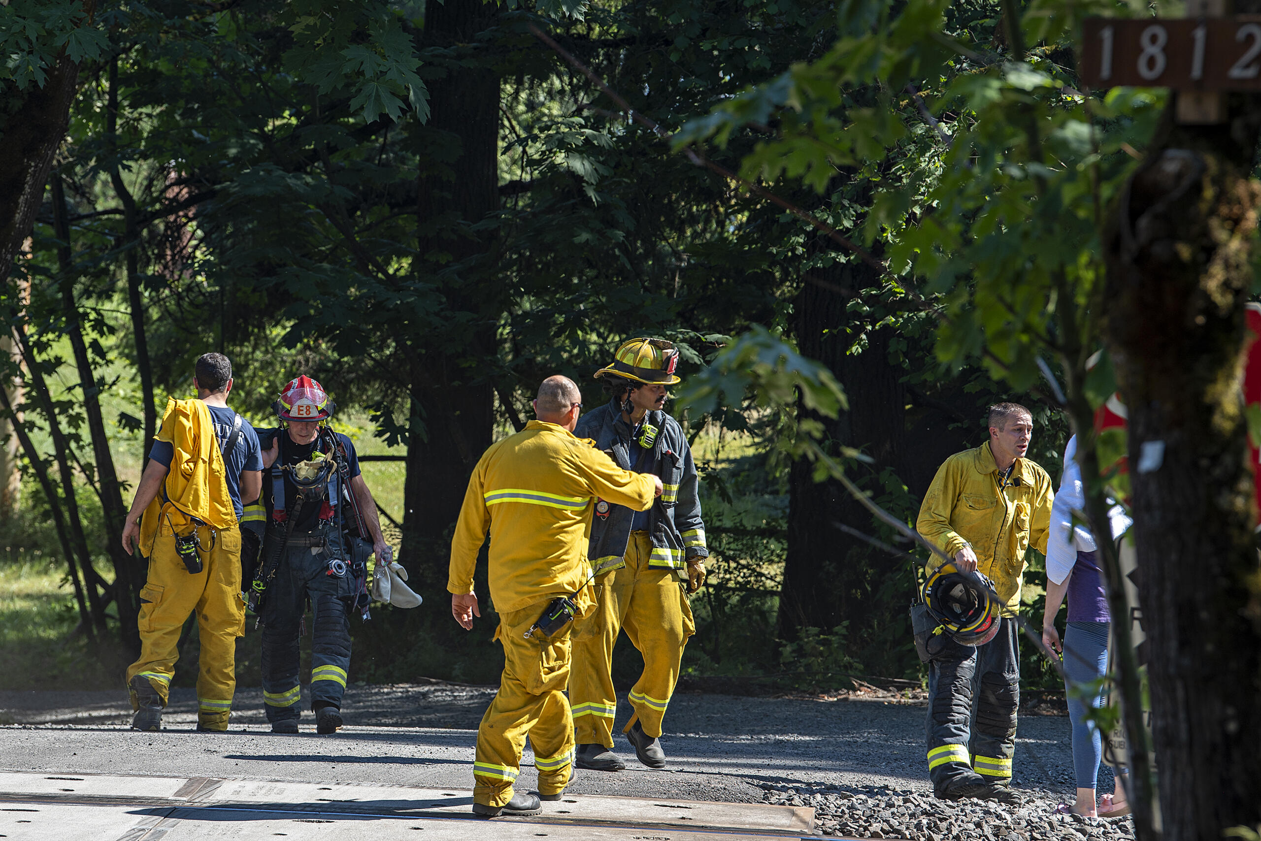 Firefighters respond to a two-alarm fire at a large house on Evergreen Highway.on Monday afternoon, June 28, 2021.
