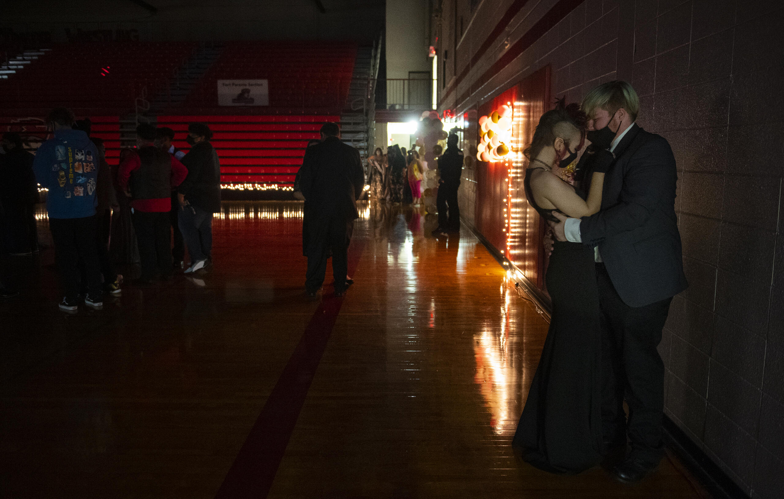 A couple finds some space to themselves while slow dancing during the Fort Vancouver High School prom on May 22. Due to COVID-19, participants had to wear masks and have their temperature checked upon arrival as well as fill out a health screening form.