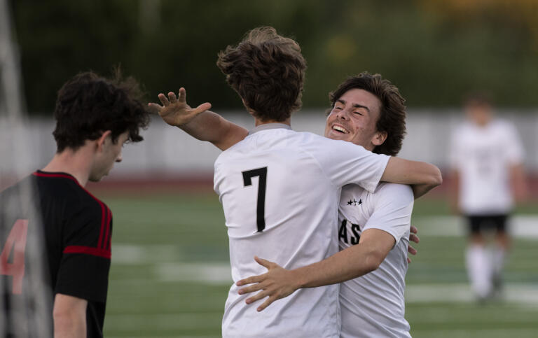 Camas senior Ethan Jud, facing, gives Hayden Rouse a hug after Rouse scored the final goal in the Papermakers’ 6-0 rout of Union on Thursday, June 3, at Union High School. The Papermakers sealed the 4A/3A Greater St.