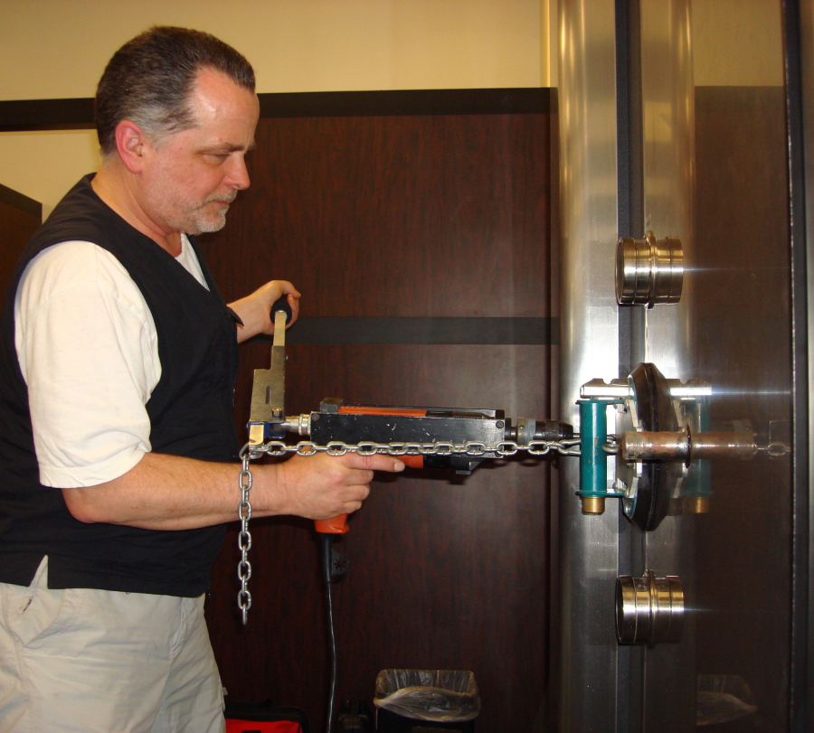 Dave McOmie, professional safecracker and your Camas neighbor, doing his thing on a typical workday.