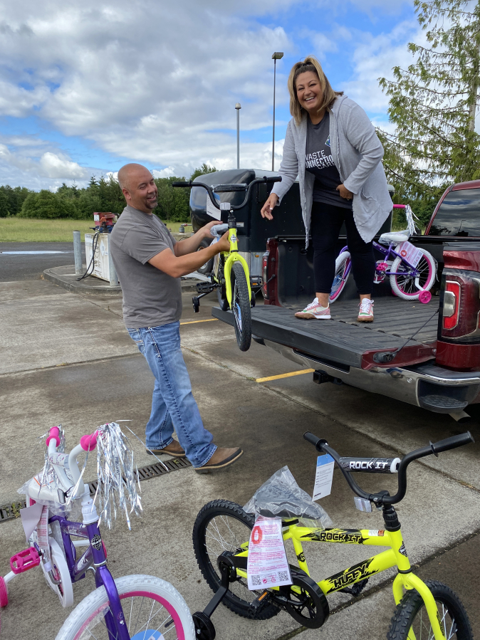 RIDGEFIELD: The Police Activities League of Southwest Washington partnered with Waste Connections to give 21 local children a bike and helmet for the start of summer.