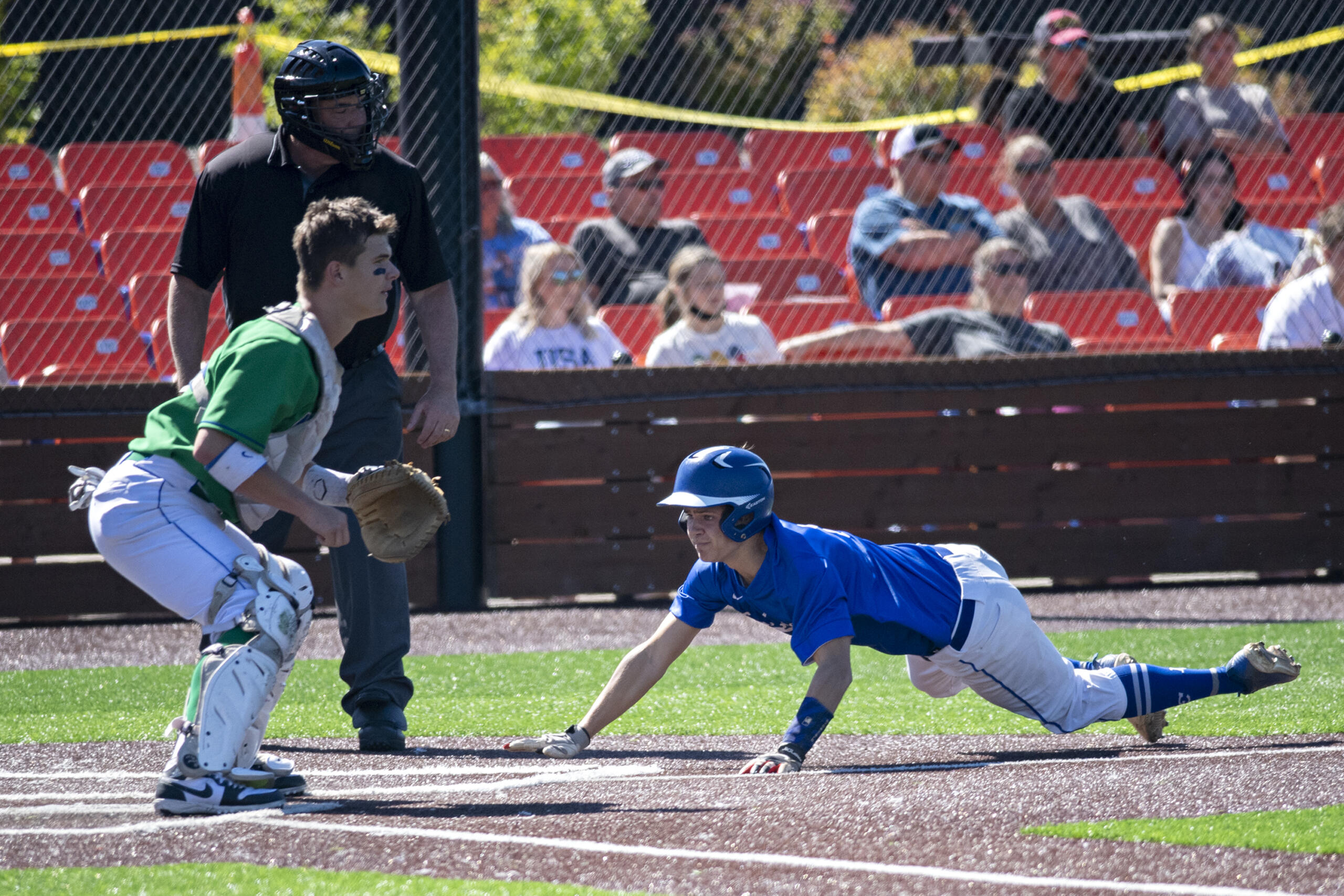 Mountain View's Riley McCarthy (7) of the National League waits for the throw as La Center's Michael Goode (7) of the American League comes in to score in the first inning during the Senior All-Star Game at Ridgefield Outdoor Recreation Center on Wednesday afternoon, June 16, 2021.