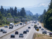 Traffic travels east on state Highway 14, right, as the highway is looking east at Interstate 205 Monday morning. WSDOT is plans to add a lane in each direction to a portion of the highway next year to ease congestion.