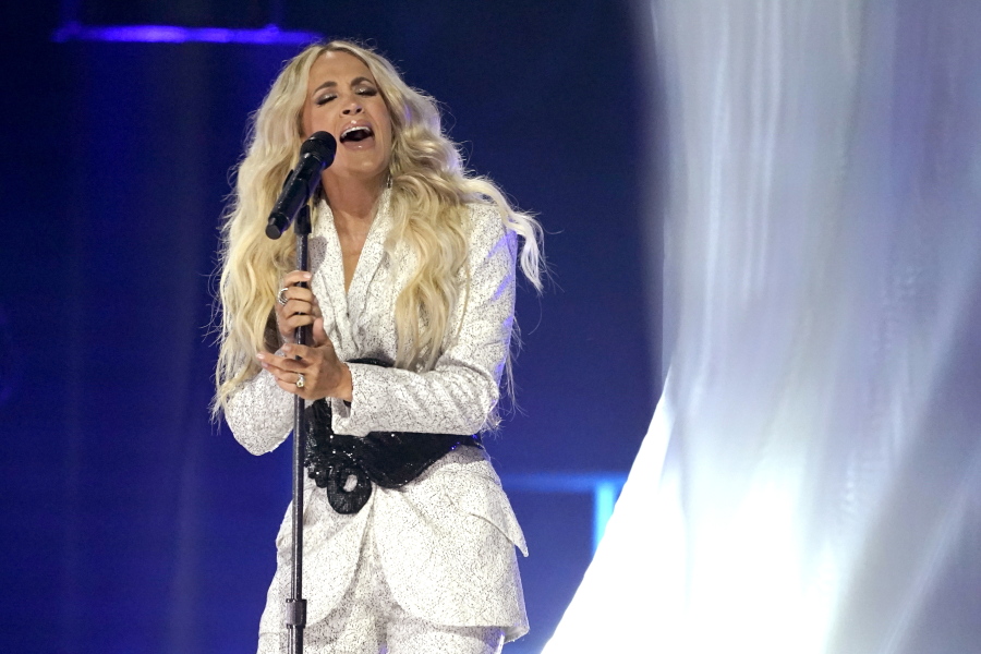 Carrie Underwood performs "I Wanna Remember" with NEEDTOBREATHE at the CMT Music Awards on Wednesday, May 5, 2021, in Nashville, Tenn. The awards show airs on June 9 with both live and prerecorded segments.