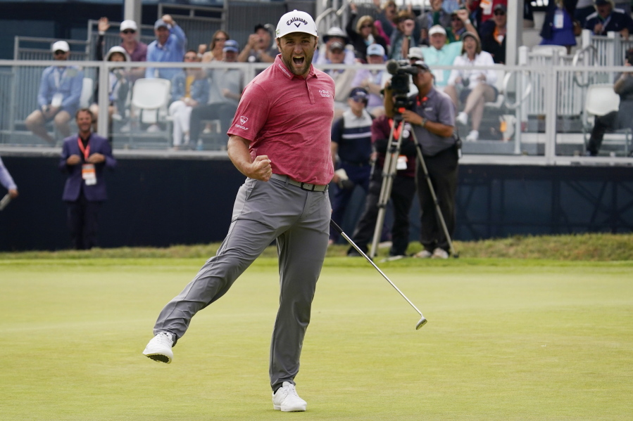 Jon Rahm reacts to making his birdie putt on the 18th green during the final round of the U.S. Open Golf Championship, Sunday in San Diego.
