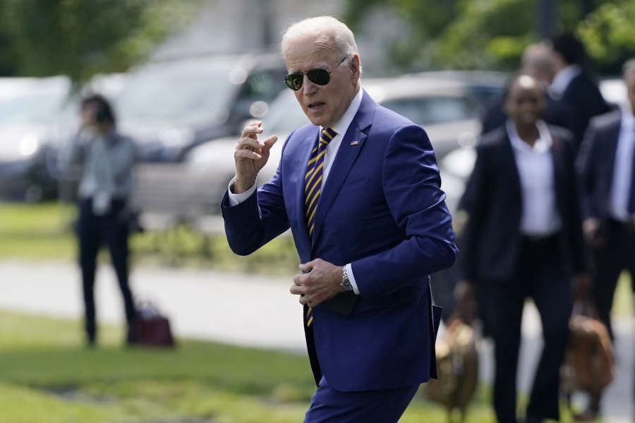 President Joe Biden walks to board Marine One on the Ellipse near the White House grounds, Friday, June 18, 2021, in Washington.