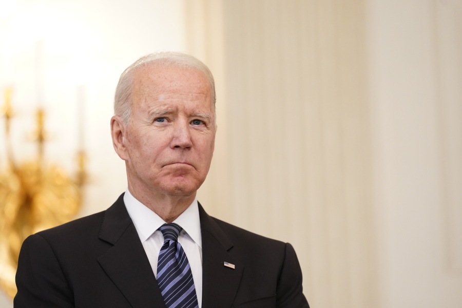 President Joe Biden listens as Attorney General Merrick Garland speaks during an event in the State Dining room of the White House in Washington, Wednesday, June 23, 2021, to discuss gun crime prevention strategy.