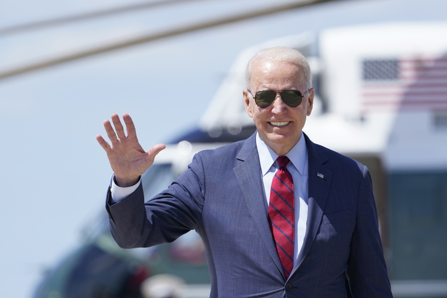 President Joe Biden waves before walking up the steps of Air Force One at Andrews Air Force Base, Md., Thursday, June 24, 2021. Biden is traveling to North Carolina and will meet with the people on the front lines of his administration's vaccination effort in Raleigh.