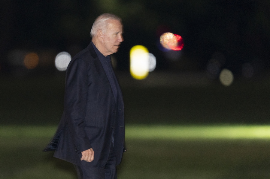 President Joe Biden walks on the Ellipse near the White House in Washington, upon arrival from a trip to Europe, late Wednesday, June 16, 2021.