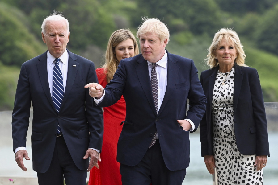 From left: US President Joe Biden, Carrie Johnson, Britain's Prime Minister Boris Johnson and First Lady Jill Biden walk outside Carbis Bay Hotel in Cornwall, Britain, Thursday June 10, 2021.