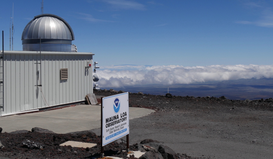 The Mauna Loa Atmospheric Baseline Observatory, atop Hawaii's largest mountain in order to sample air free of local pollution. Heat-trapping carbon dioxide levels in the air peaked in May 2021, scientists reported Monday.
