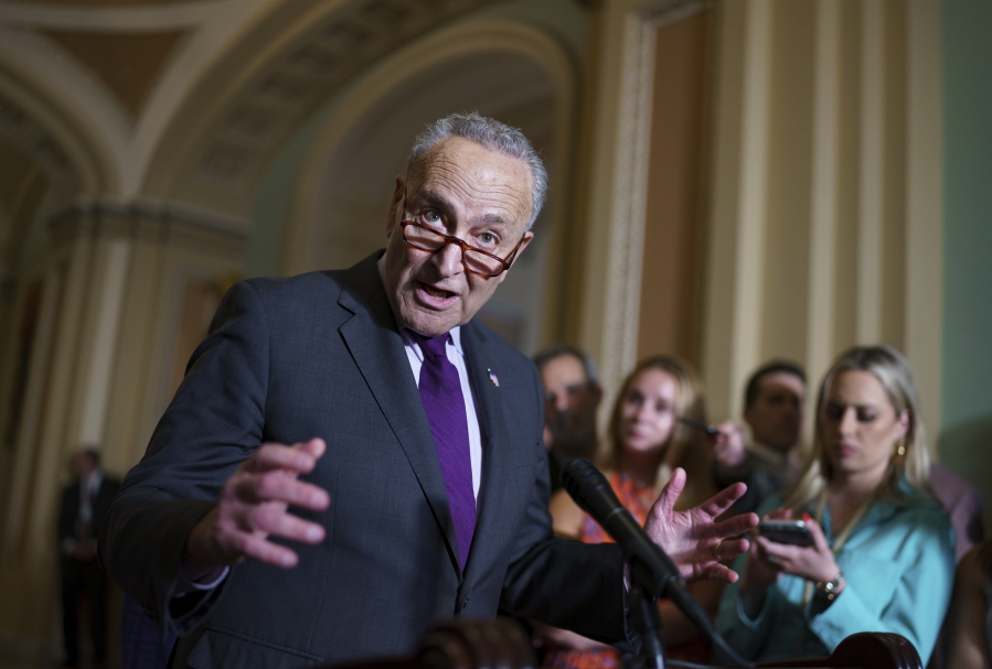 Senate Majority Leader Chuck Schumer, D-N.Y., and the Democratic leadership speak to reporters about progress on an infrastructure bill and voting rights legislation, at the Capitol in Washington, Tuesday, June 15, 2021. (AP Photo/J.
