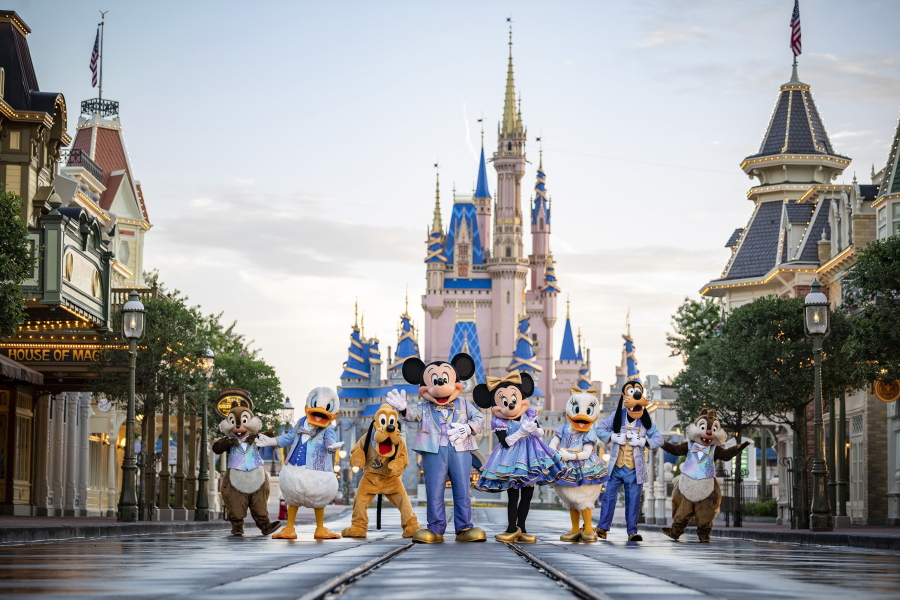 This undated photo provided by Walt Disney World shows Disney characters at Walt Disney World in Lake Buena Vista, Fla. Walt Disney World is planning an 18-month celebration in honor of its 50th anniversary, starting in October 2021.