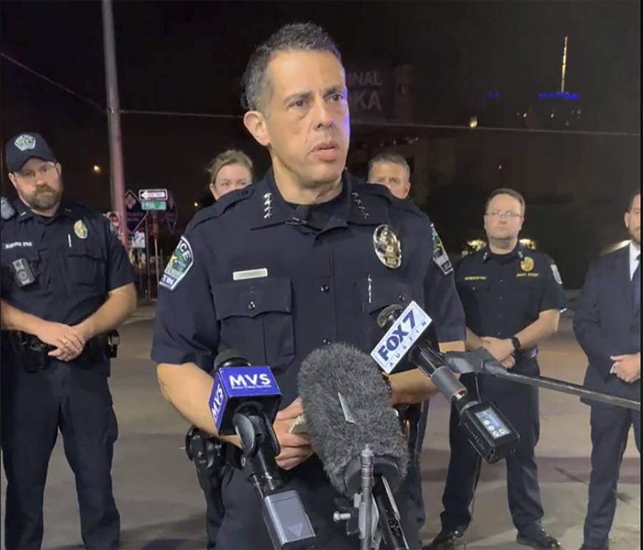 This photo provided by Austin Police Department shows Chief Chacon providing an update on overnight shootings in Austin, Texas, early Saturday, June 12, 2021.  Chacon says gunfire erupted in a busy entertainment district downtown early Saturday injuring several.