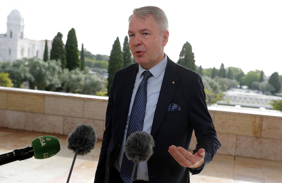 FILE - In this Thursday, May 27, 2021 file photo, Finland's Foreign Minister Pekka Haavisto speaks with the media in Lisbon. A European Union envoy says Ethiopia's leaders told him in closed-door talks earlier this year that "they are going to wipe out the Tigrayans for 100 years." The envoy, Pekka Haavisto, Finland's foreign minister, says such an aim "looks for us like ethnic cleansing." Haavisto spoke in a question-and-answer session Tuesday, June 15 with a European Parliament committee.