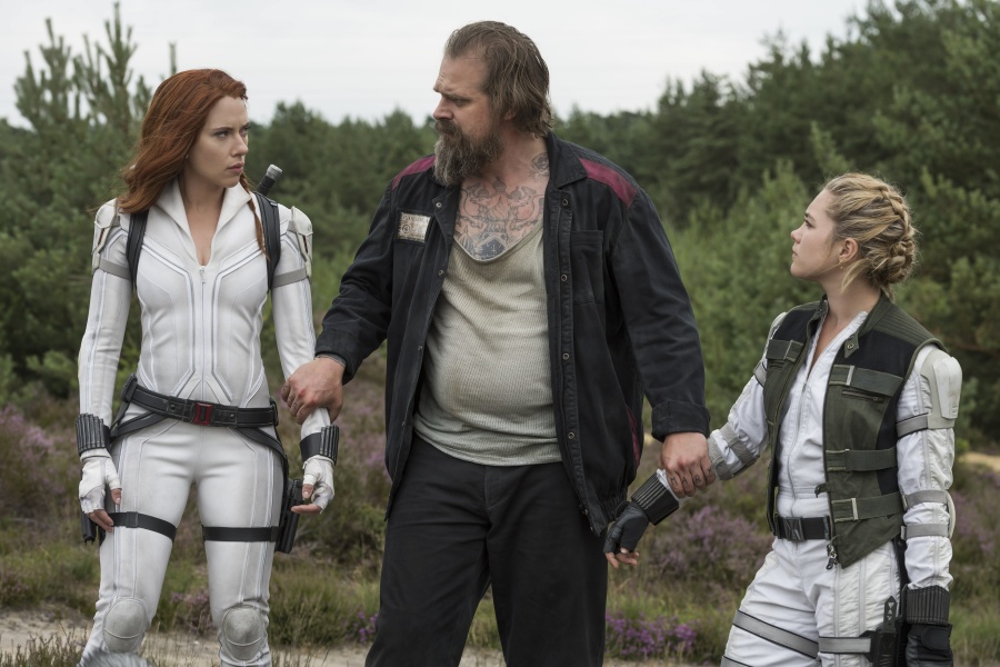 From left: Scarlett Johansson, David Harbour and Florence Pugh perform in "Black Widow." (Marvel Studios)