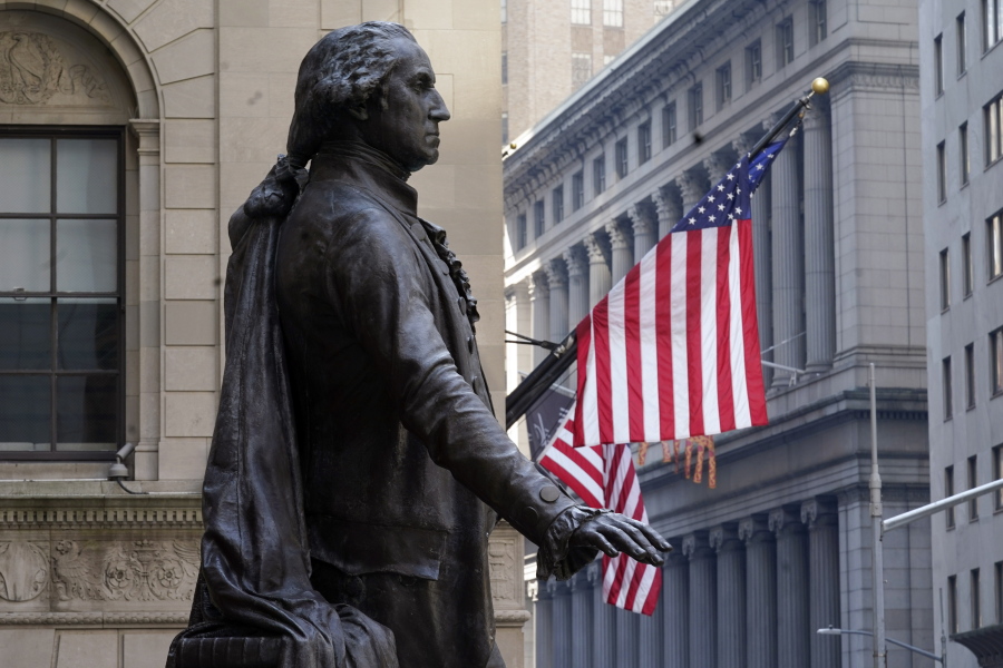 The Federal Hall statue of George Washington overlooks the New York Stock Exchange, Monday, June 7, 2021. Stocks are nudging mostly higher in early trading, putting the S&P 500 and the Dow Jones Industrial Average back near the record highs they reached a month ago.