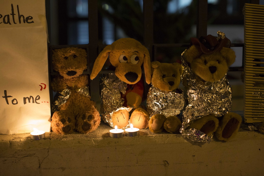 FILE - In this Wednesday, June 20, 2018, file photo, stuffed toy animals wrapped in aluminum foil representing migrant children separated from their families are displayed in protest in front of the United States embassy in Guatemala City.