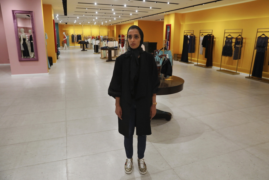 Nasrin Hassani, a 34-year-old dressmaker, poses for a photo in a women's clothing store at Tehran Mall shopping center, in Tehran, Iran, Wednesday, June 9, 2021. Iranians this week are preparing to vote in -- or perhaps boycott -- a presidential election that many fear will only underscore their powerlessness to shape the country's fate. "We have reached a point now that we wish we could return to where we were five and six years ago ... even if we can't have things improved," lamented Hassani.