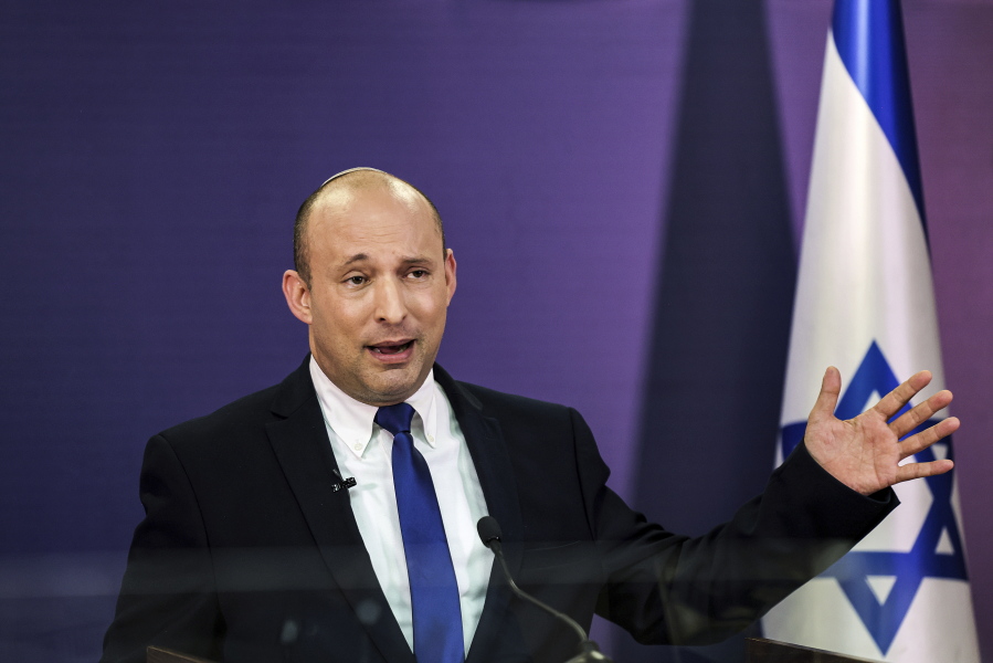 Naftali Bennett, Israeli parliament member from the Yamina party, gives a statement June 6 at the Knesset, Israel's parliament, in Jerusalem. Israel's next government, which will be led by the ultranationalist Bennett, has vowed to chart a new course aimed at healing the country's divisions and restoring a sense of normalcy.