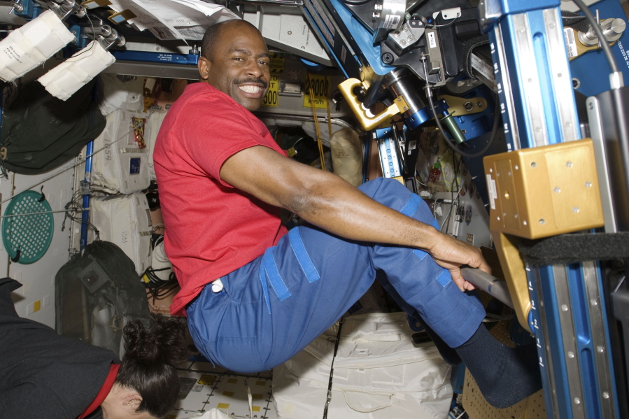 Astronaut Leland Melvin exercises Nov. 22, 2009, in the Unity module of the International Space Station while the space shuttle Atlantis is docked. Astronauts on the space station exercise two hours daily.