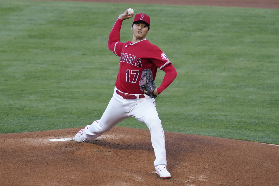Los Angeles Angels starting pitcher Shohei Ohtani (17) throws during the first inning of a baseball game against the Seattle Mariners Friday, June 4, 2021, in Anaheim, Calif.